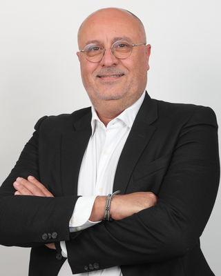 ALI TAZI
